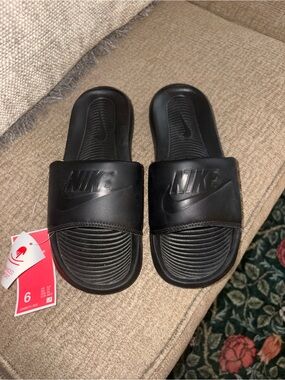 Nike Black Men's Slide Sandals with Embossed Logo
